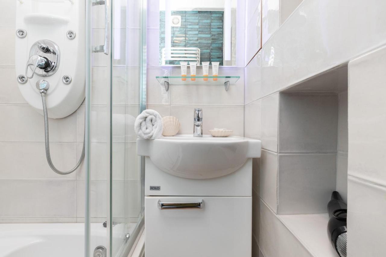 Mokotow Apartments Reytan By Noclegi Renters Varşovia Exterior foto